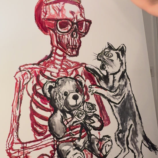 Salma López painting an original acrylic ink artwork In her studio